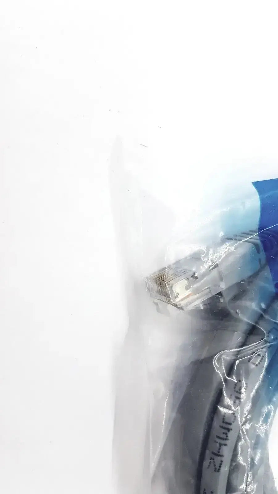 Black cat5e molded grey ethernet cable with clear plastic connector and blue packaging by genuine cables togo