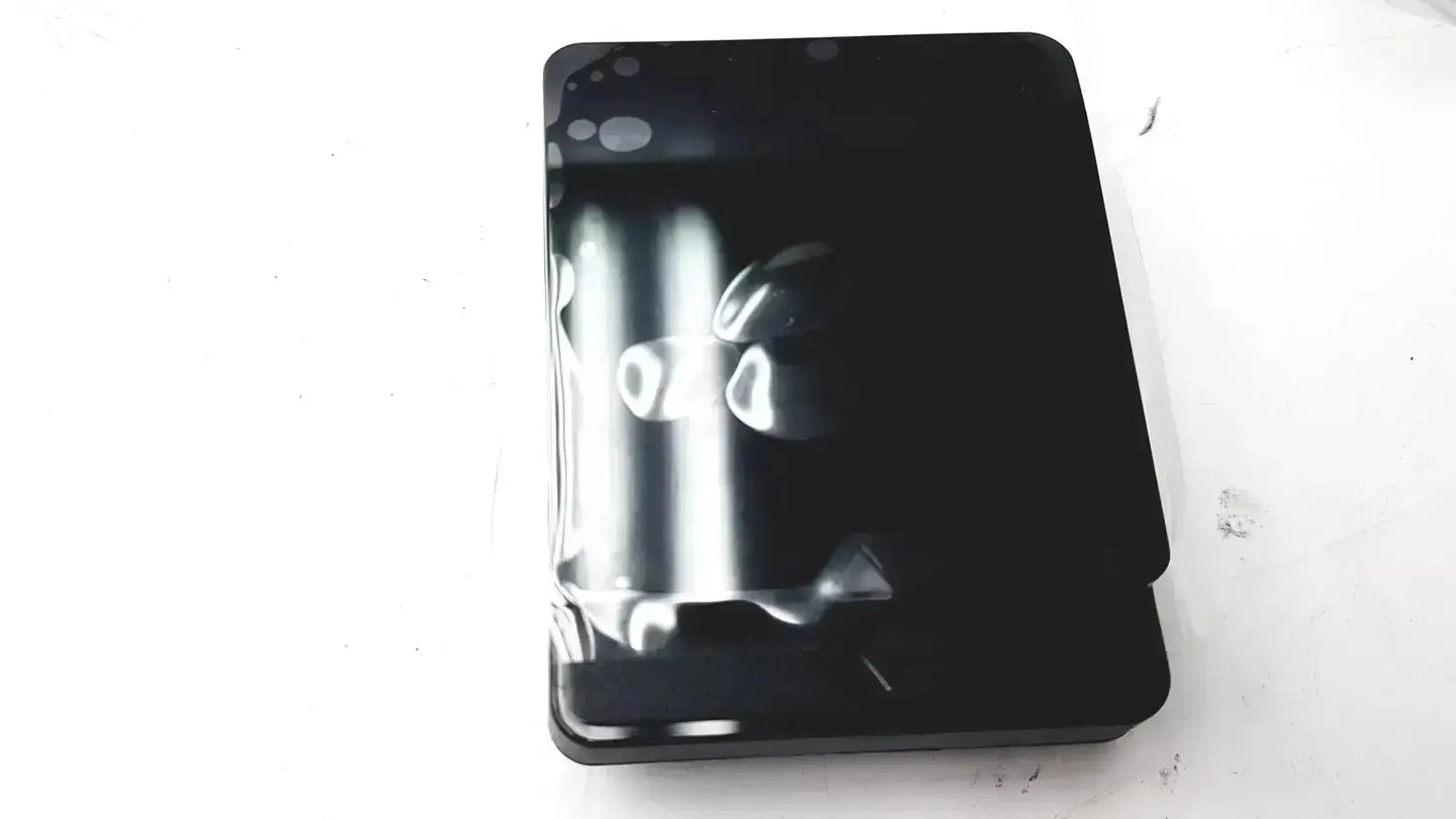Black smartphone with glossy finish and camera cutout showing the back of genuine hp cc543b smartcard niprnet solution device
