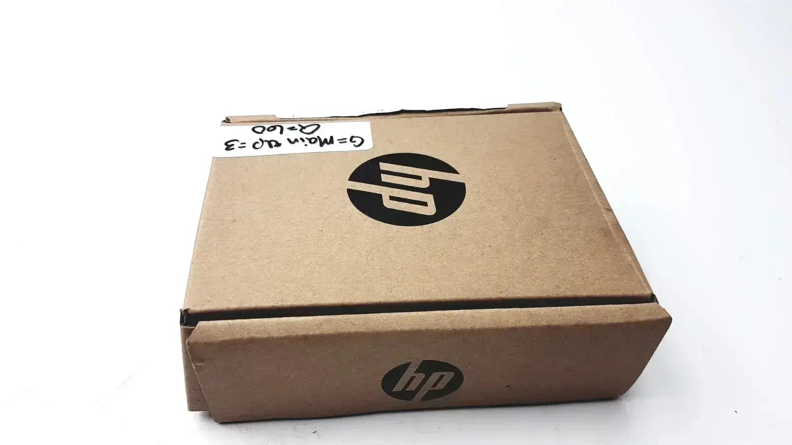 Brown cardboard hp box with black logo and handwritten label for genuine hp cc543b smartcard niprnet solution product