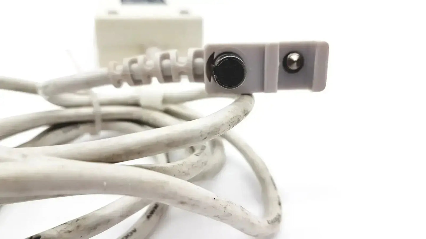 White coiled power cord with rectangular plug featuring two circular ports for spacelabs snp-a085-3y adapter 20v 90w