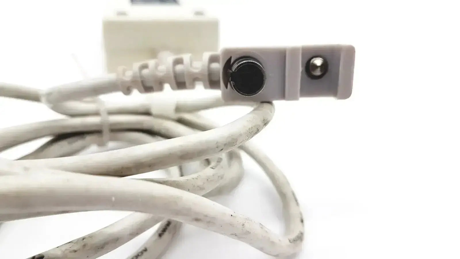 White coiled power cord with rectangular plug featuring two circular ports for spacelabs snp-a085-3y adapter 20v 90w