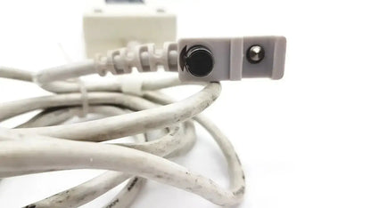 White coiled power cord with rectangular plug featuring two circular ports for spacelabs snp-a085-3y adapter 20v 90w