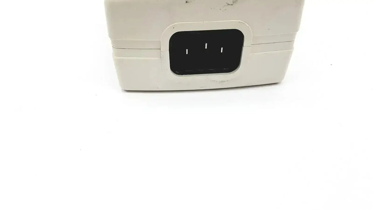 Off-white plastic spacelabs snp-a085-3y power adapter with black three-slot port used medical equipment for sale