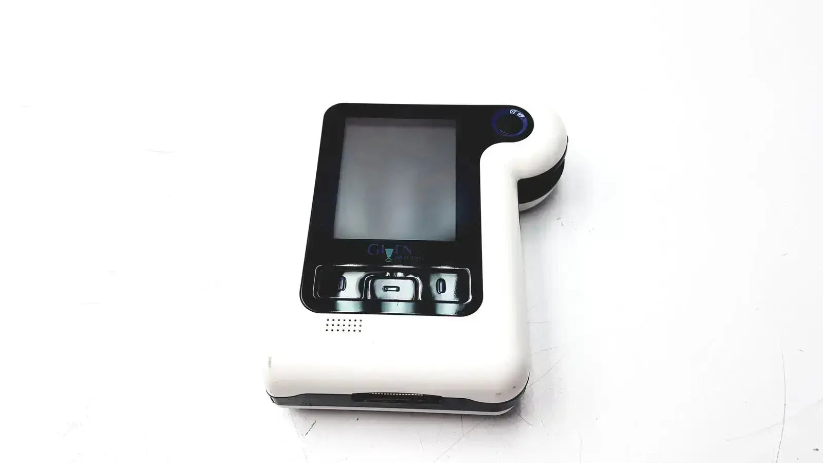 White and black handheld imaging pillcam recorder dr3 with small screen three buttons and blue circular sensor on top right