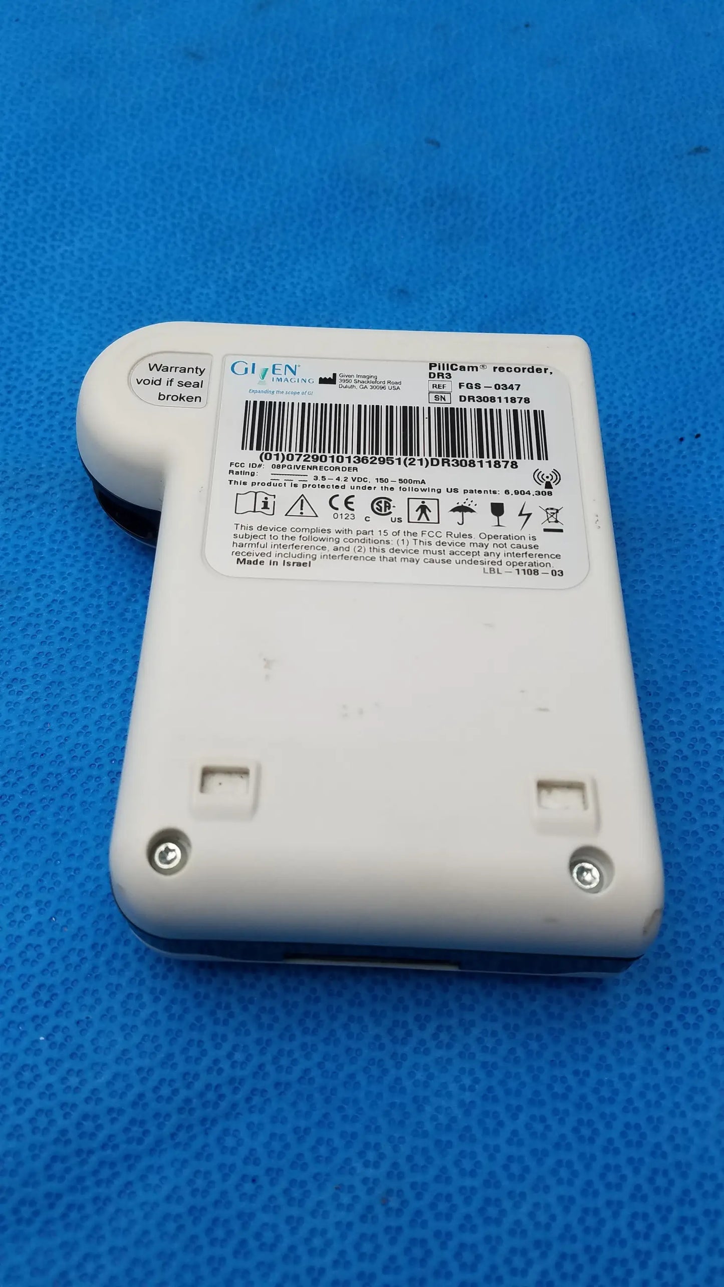 White plastic given imaging pillcam recorder dr3 with rounded top and two screw holes for buy used medical equipment