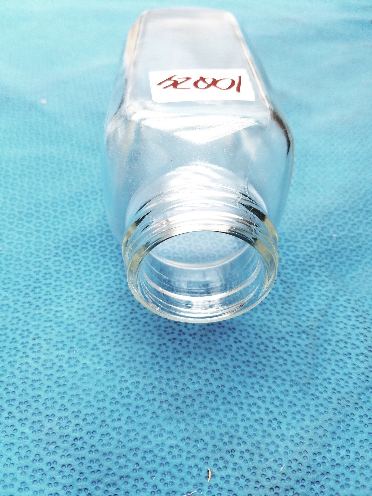 Glass Bottle with Black Cap Marked “84” – Lab Container - Laboratory