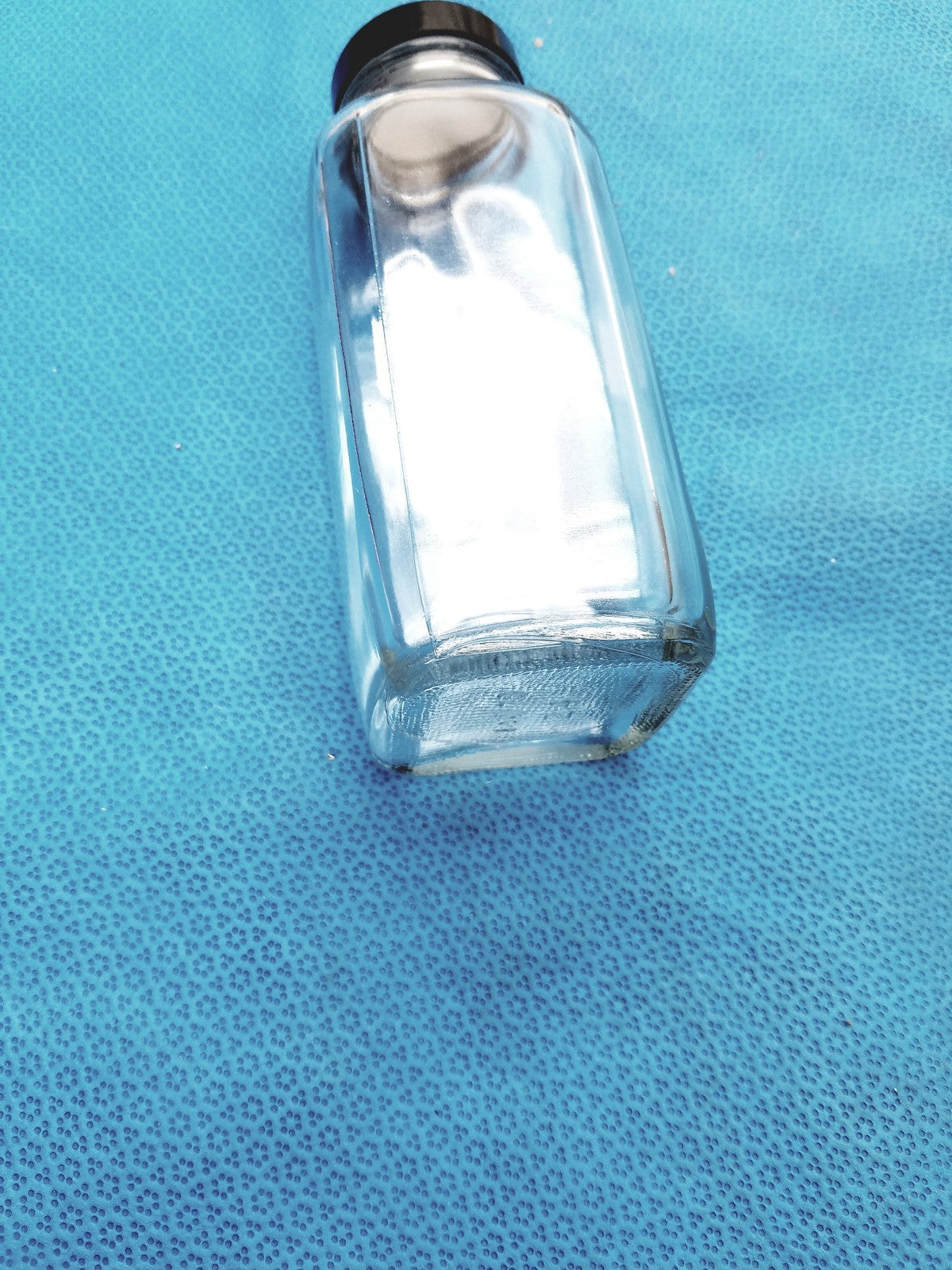 Glass Bottle with Black Cap Marked “84” – Lab Container - Laboratory