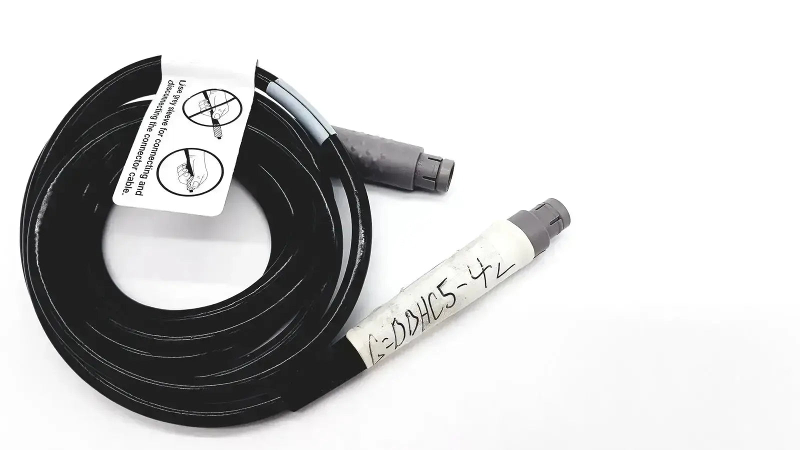 Black coiled glideScope 0600-0237 connector cable with gray connectors and white handwritten label for buy used medical equipment