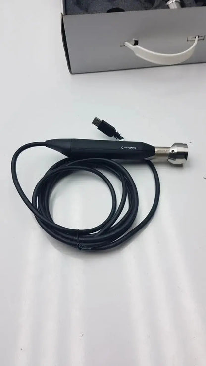 Black handheld endoscope with silver metallic tip and coiled cable from globalmed total exam ke018257 hd 1080p camera