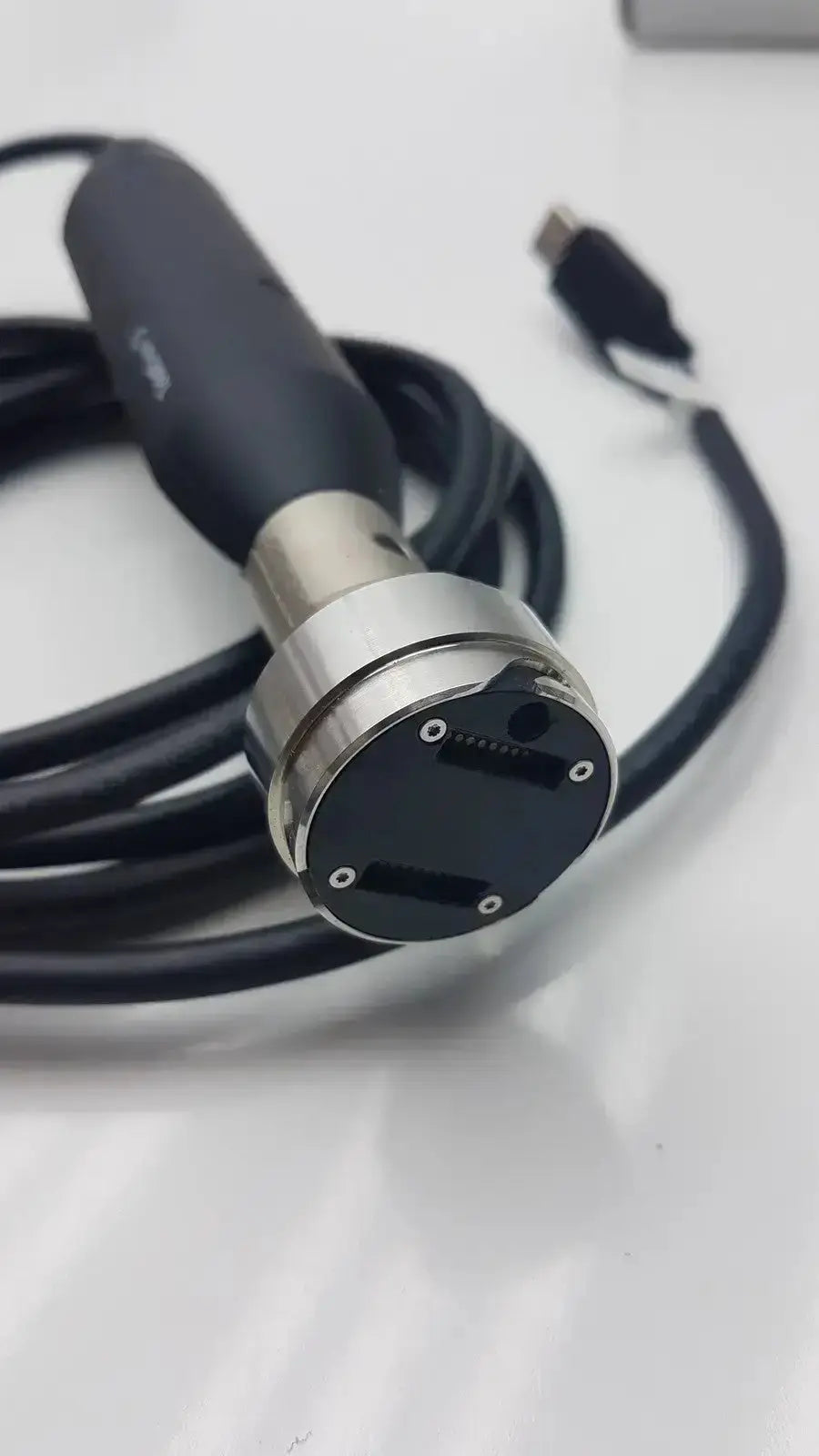 Black and silver handheld endoscope with coiled cable globalmed total exam ke018257 hd 1080p camera