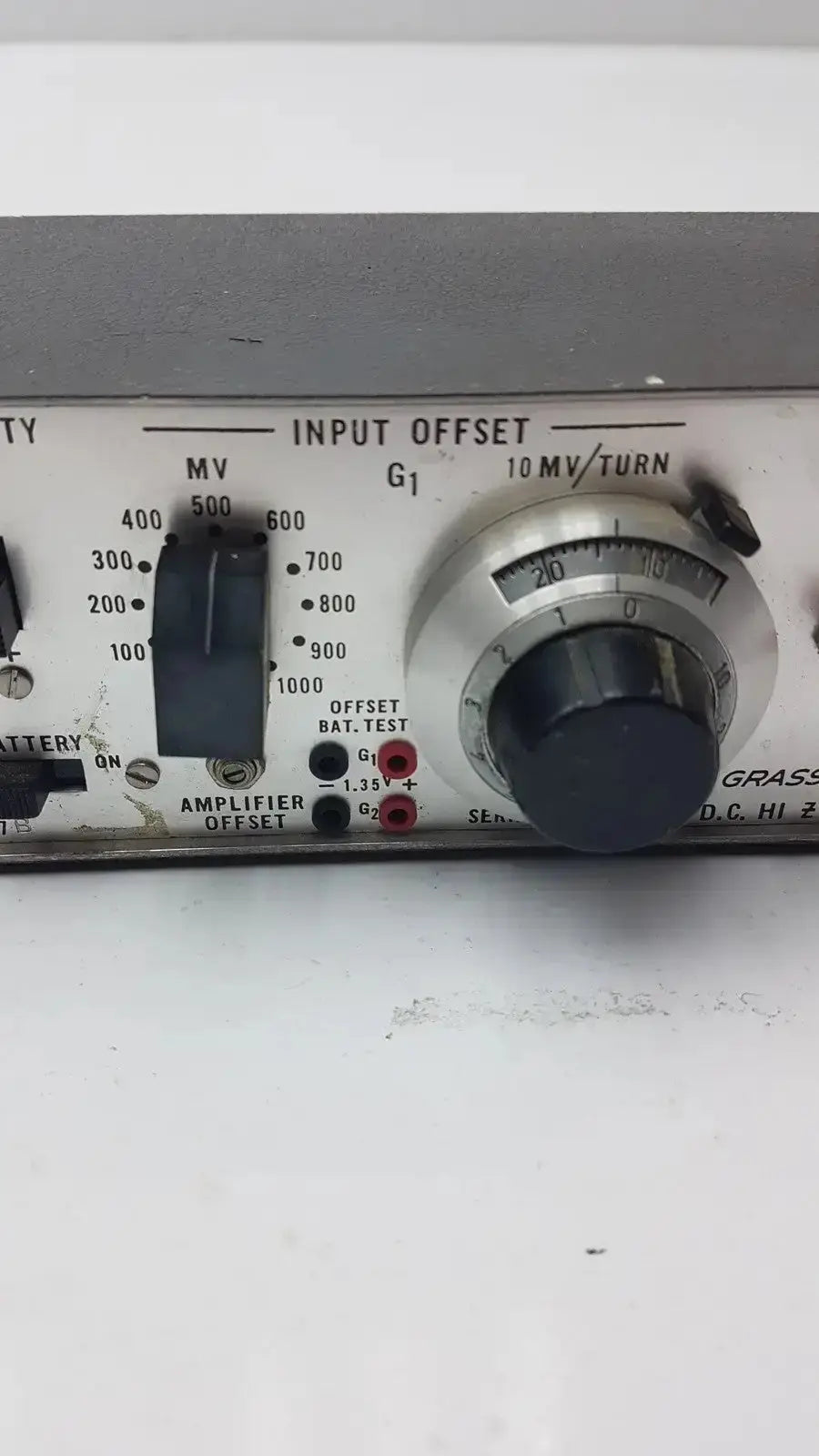 Gray metal grass instrument amplifier model p17b with black knobs and white labeling for audio testing equipment