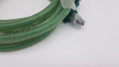 Green suction pump water hose with metal threaded connector and dark green plastic fittings coated with green mesh