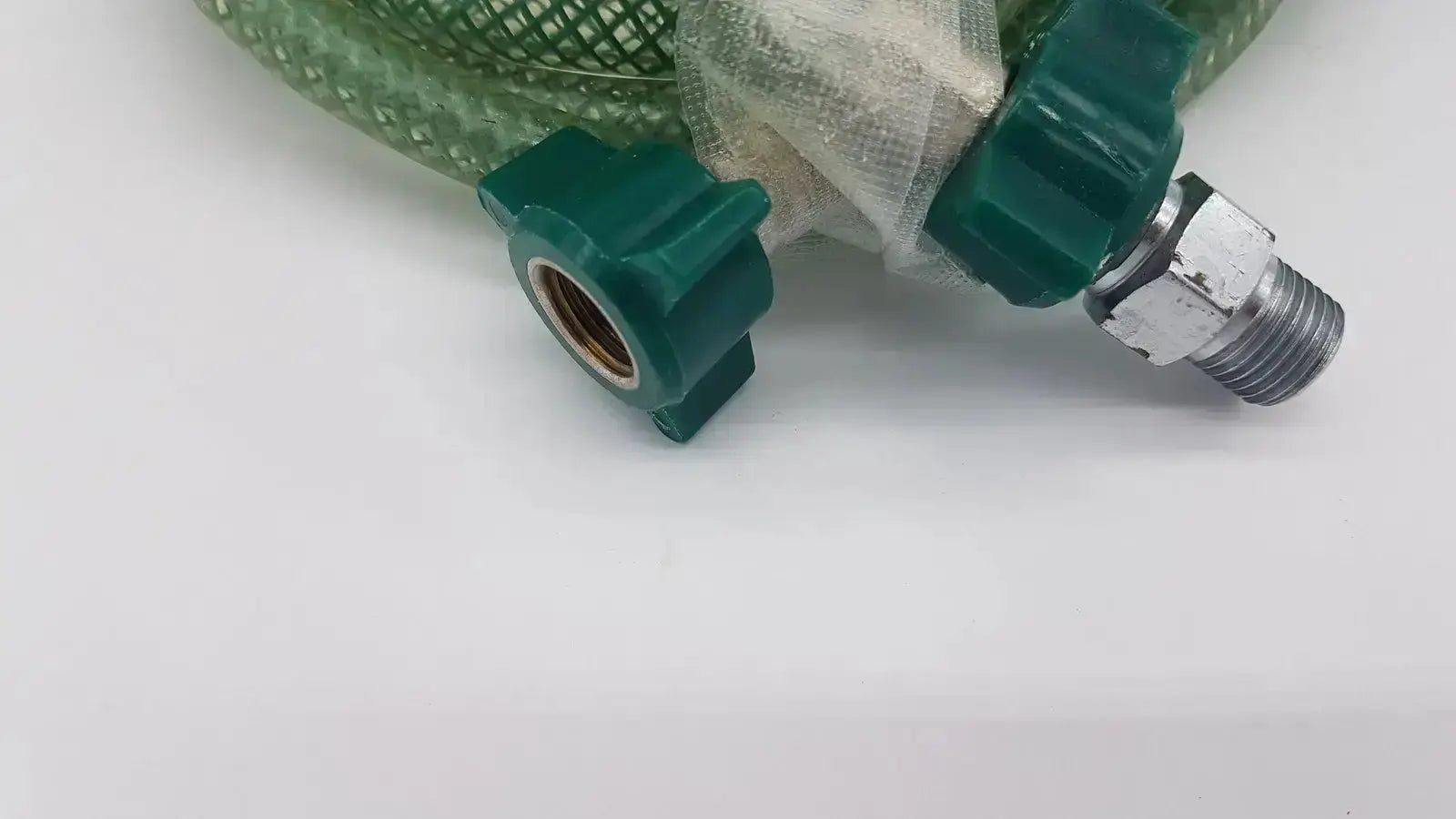 Green suction pump water hose with green mesh tubing and metal threaded connector for suction pump applications