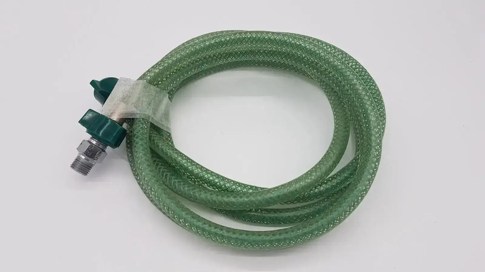 Green suction pump water hose with green braided design, plastic valve, and metallic threaded connector for suction pump use