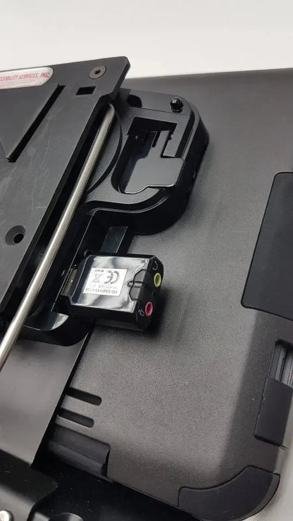 Black plastic audio adapter with red green and yellow ports on the back of grid pad g-bbda2-10d used medical equipment for sale