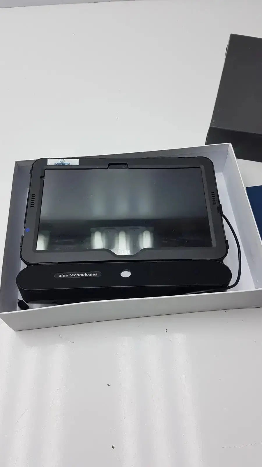 Black grid pad tablet with rugged protective casing and alea technologies branding for sensory software g-bbda2-10d used medical equipment for sale