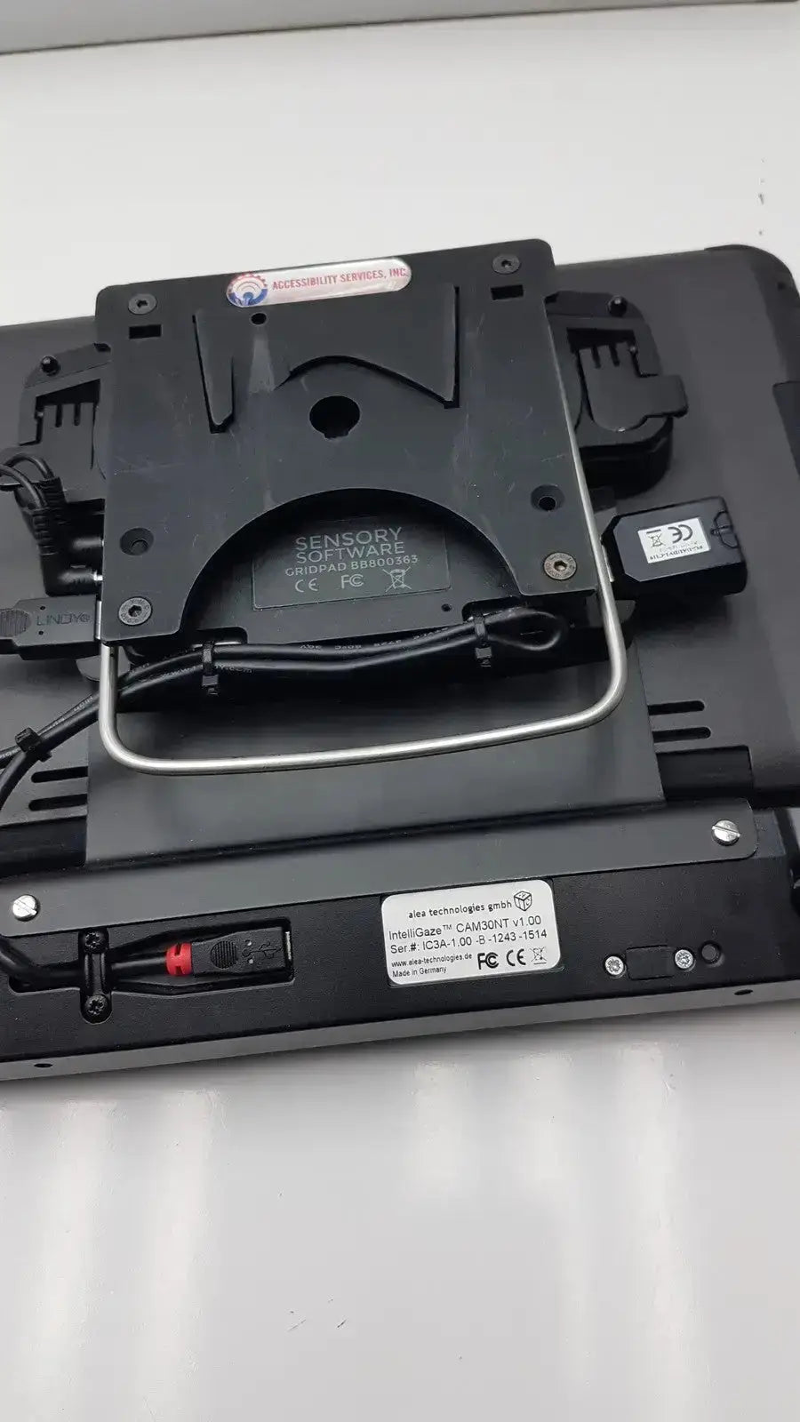 Black plastic grid pad g-bbda2-10d with metal bracket and cables labeled intel qube camsoft 1.0 used medical equipment for sale