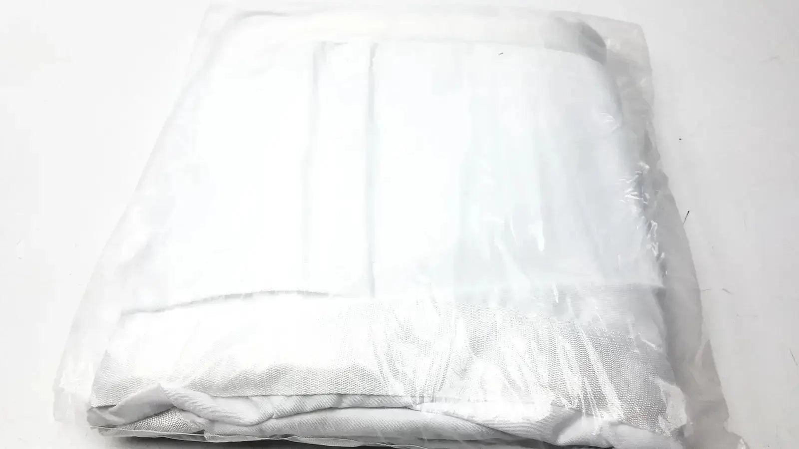 White soft-textured guldmann disposable bariatric sling wrapped in clear plastic packaging size xxl xxxl</assistant