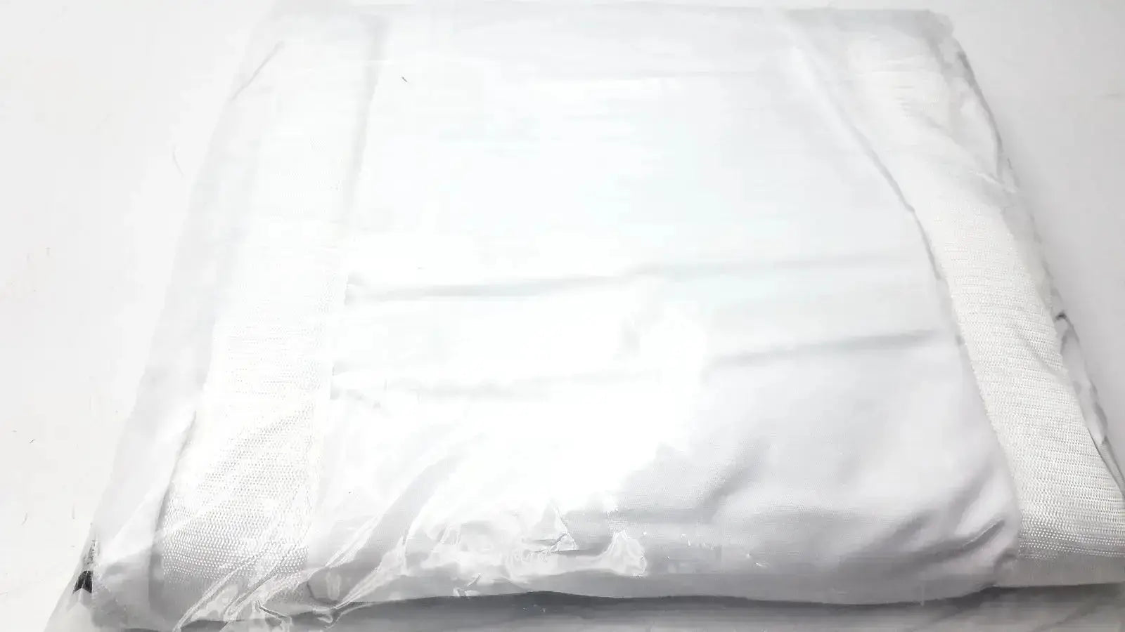 White slightly crinkled plastic guldmann disposable bariatric sling xxl xxxl for high weight capacity use