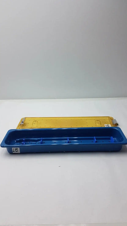 Blue plastic slimline sterilization tray with yellow counterpart for reuse medical equipment in gyrus mra-gt series