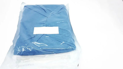 Blue surgical gown sealed in clear plastic packaging for general drapes buy used medical equipment for sale halyard 89274