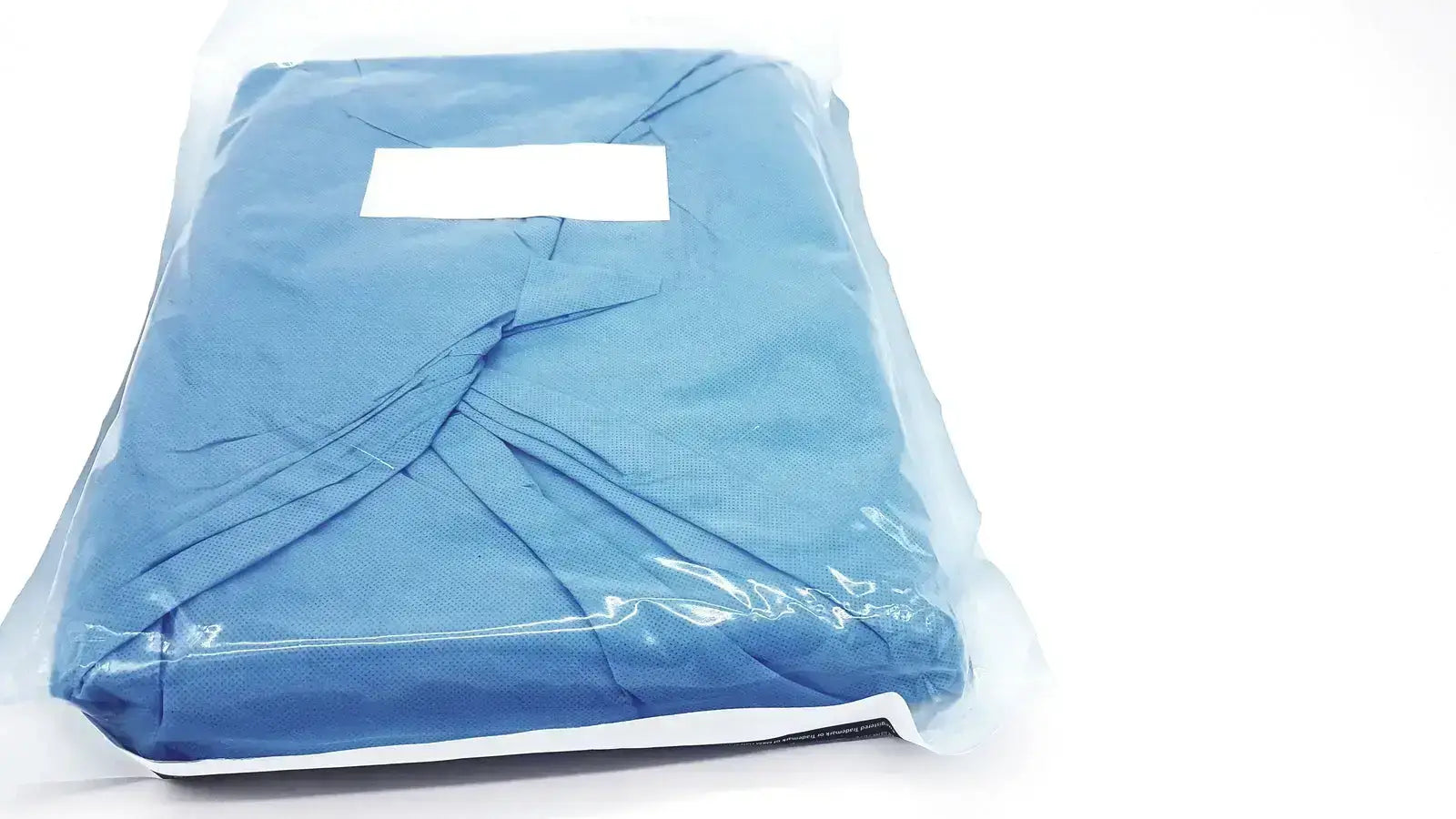 Blue surgical gown sealed in clear plastic packaging of halyard 89274 orthoarts shoulder split drape general drapes buy used medical equipment