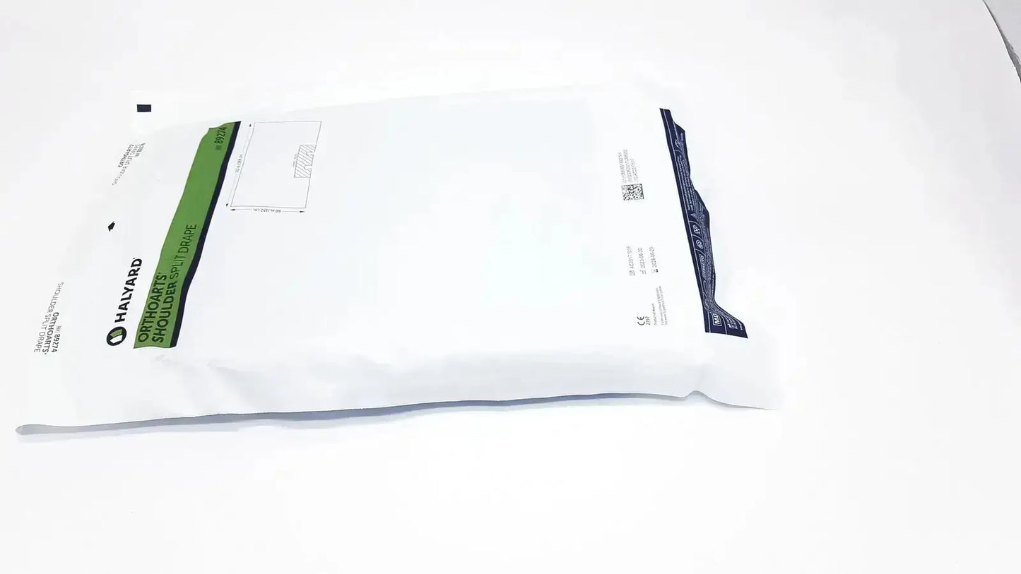 White harvard brand surgical gown with green and navy blue labeling for halyard 89274 orthoarts shoulder split drape buy used medical equipment