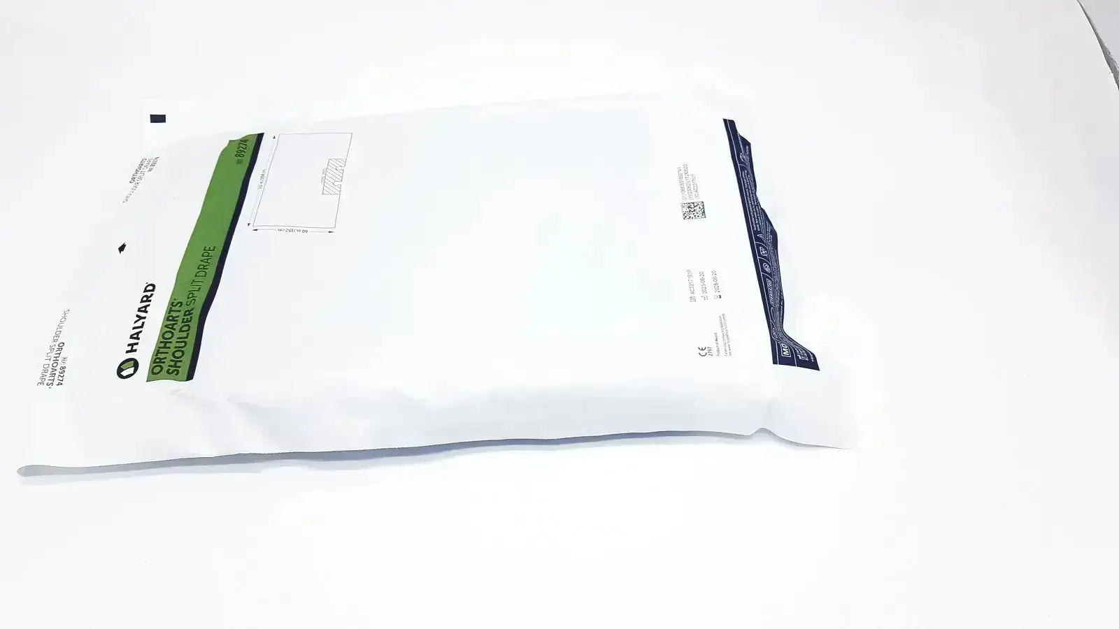 White harvard brand surgical gown with green and navy blue labeling for halyard 89274 orthoarts shoulder split drape buy used medical equipment