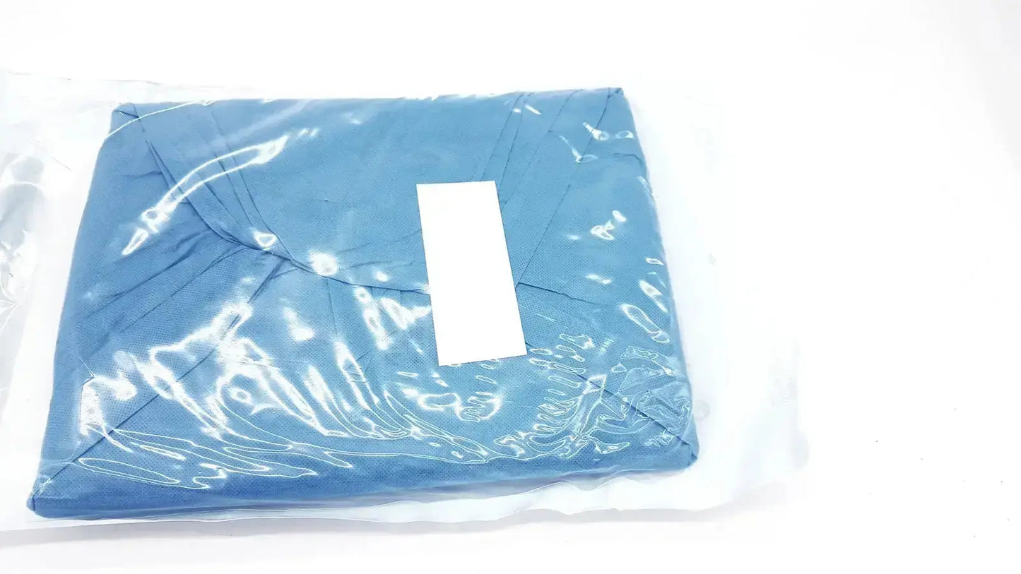 Blue surgical gown in clear plastic packaging with white label of halyard 89274 orthoarts shoulder split drape for general drapes