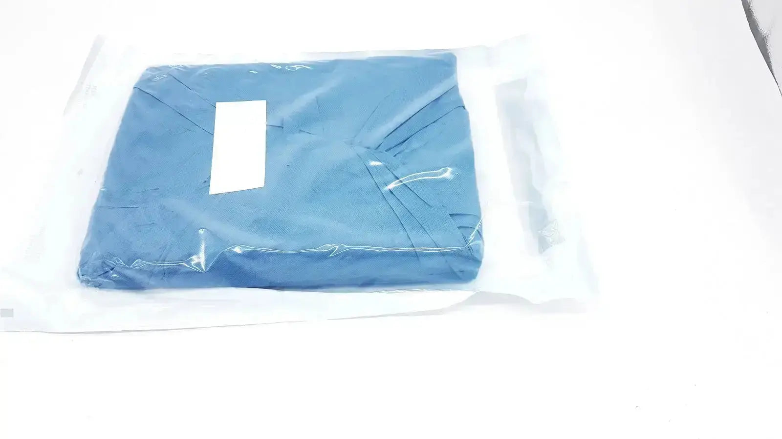 Blue surgical gown packaged in clear plastic for halyard 89274 orthoarts shoulder split drape general drapes