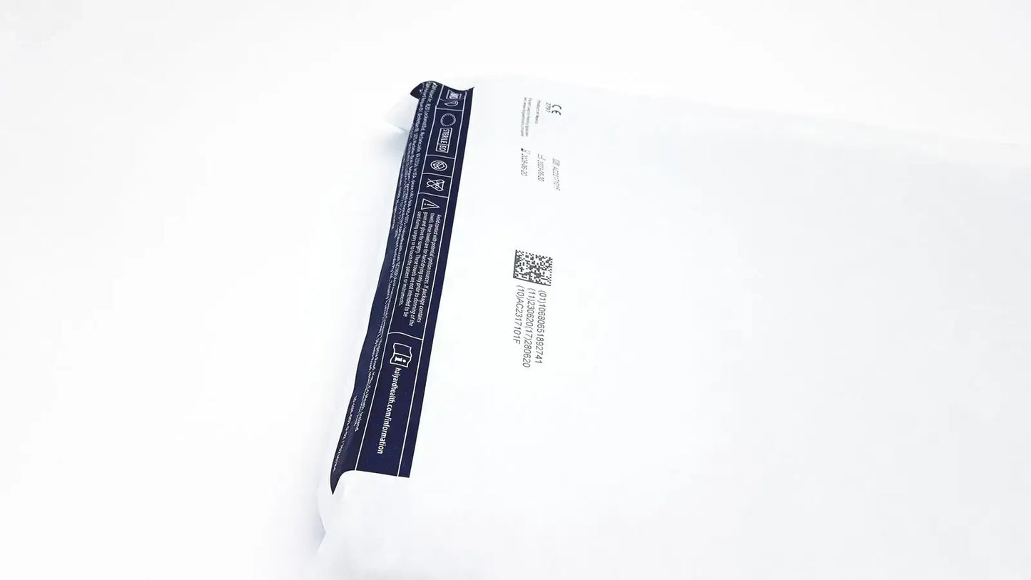 White plastic packaging with navy blue label for halyard 89274 orthoarts shoulder split drape 112in x 60in general drapes
