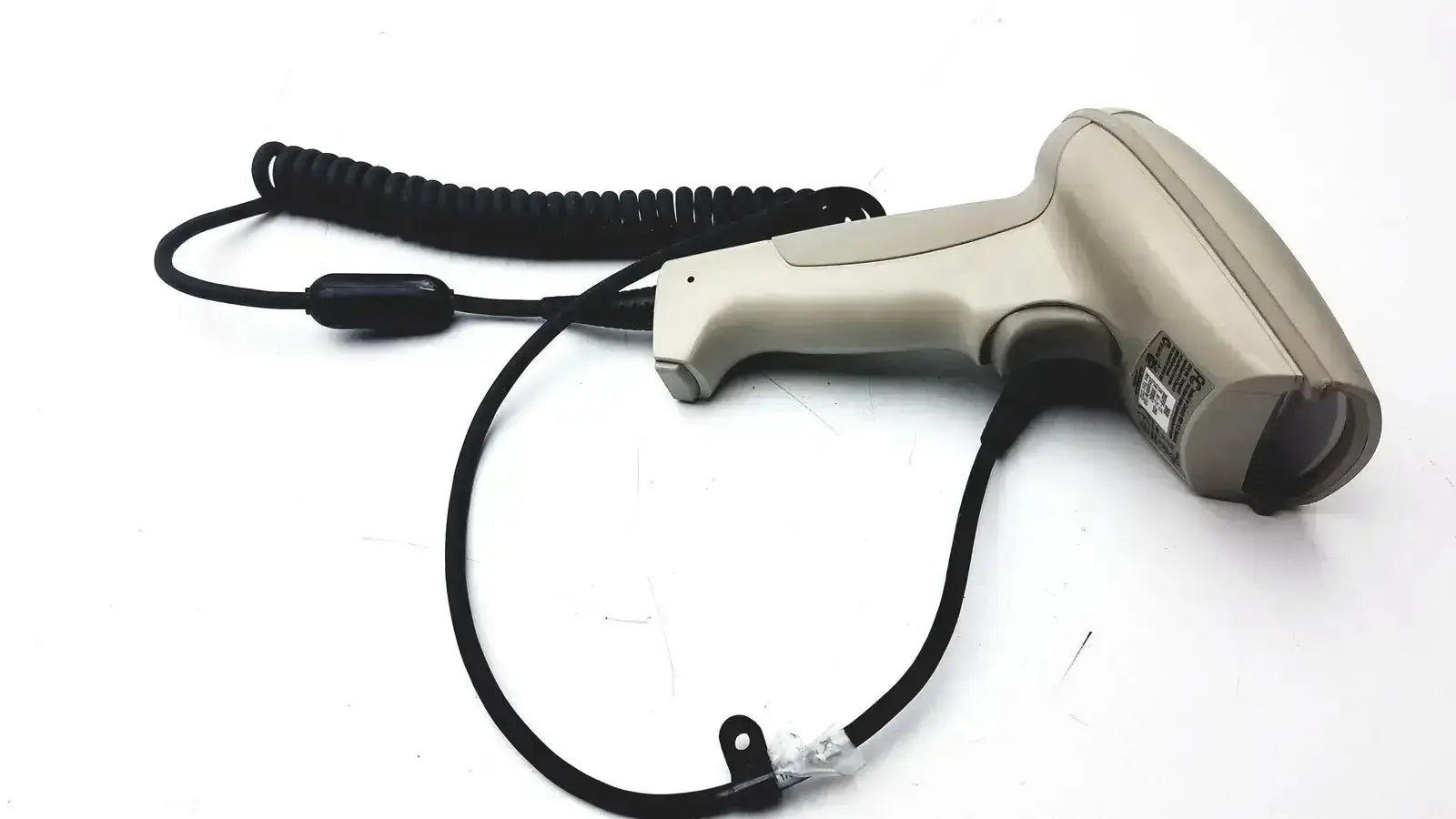 Beige hand held products 3800pdf-12e barcode scanner with coiled black cable and small black connector for scanning tasks
