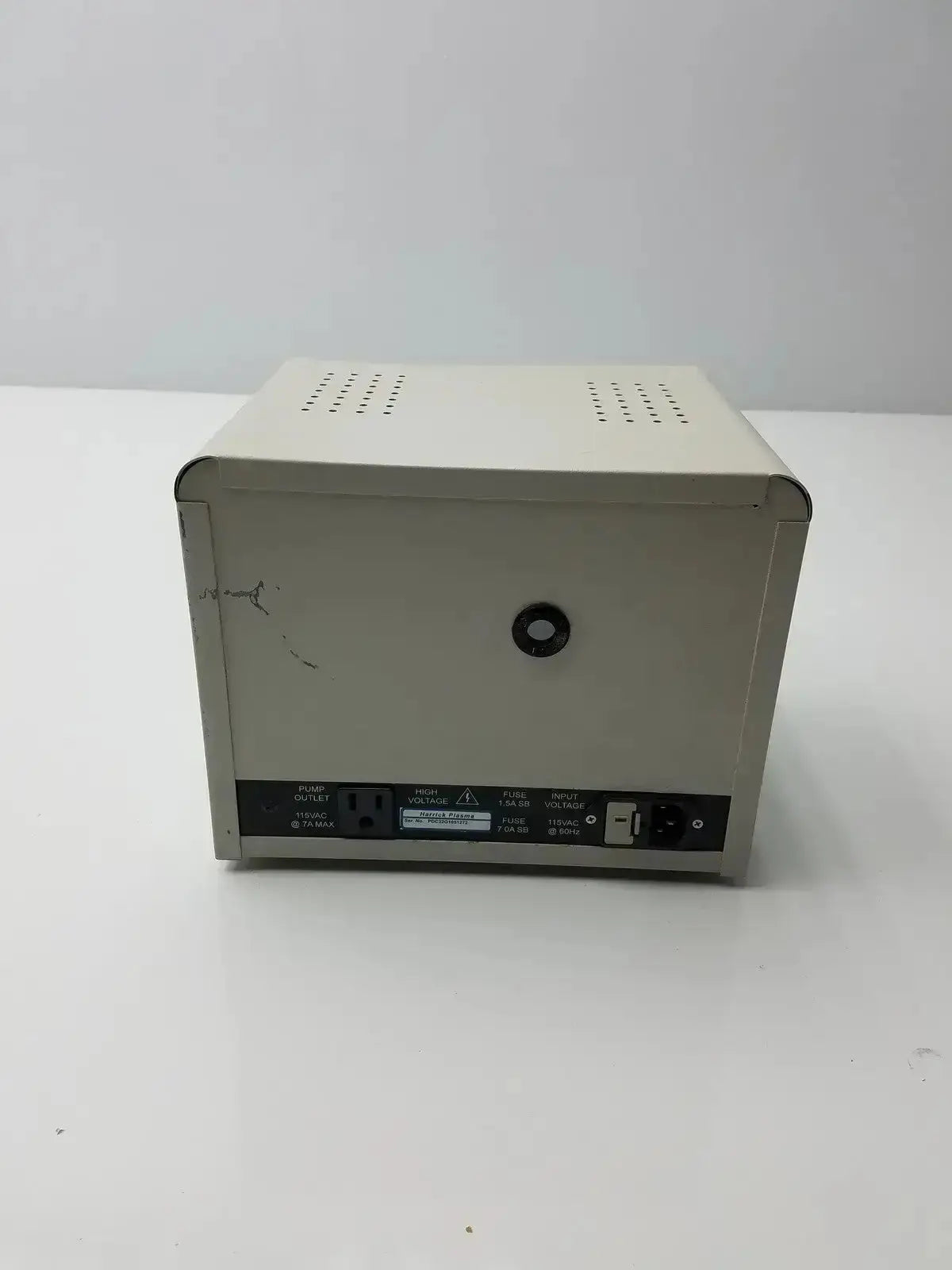 Beige rectangular harrick pdc-32g compact plasma cleaner sterilizer back side with ventilation panels and black circular port
