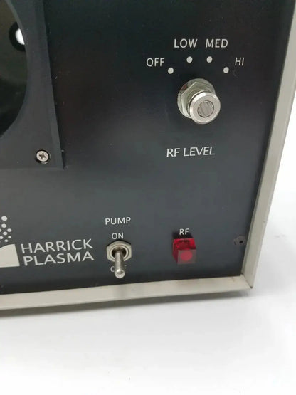 Black harrick plasma cleaner sterilizer with silver control knob and red indicator light for compact table-top use