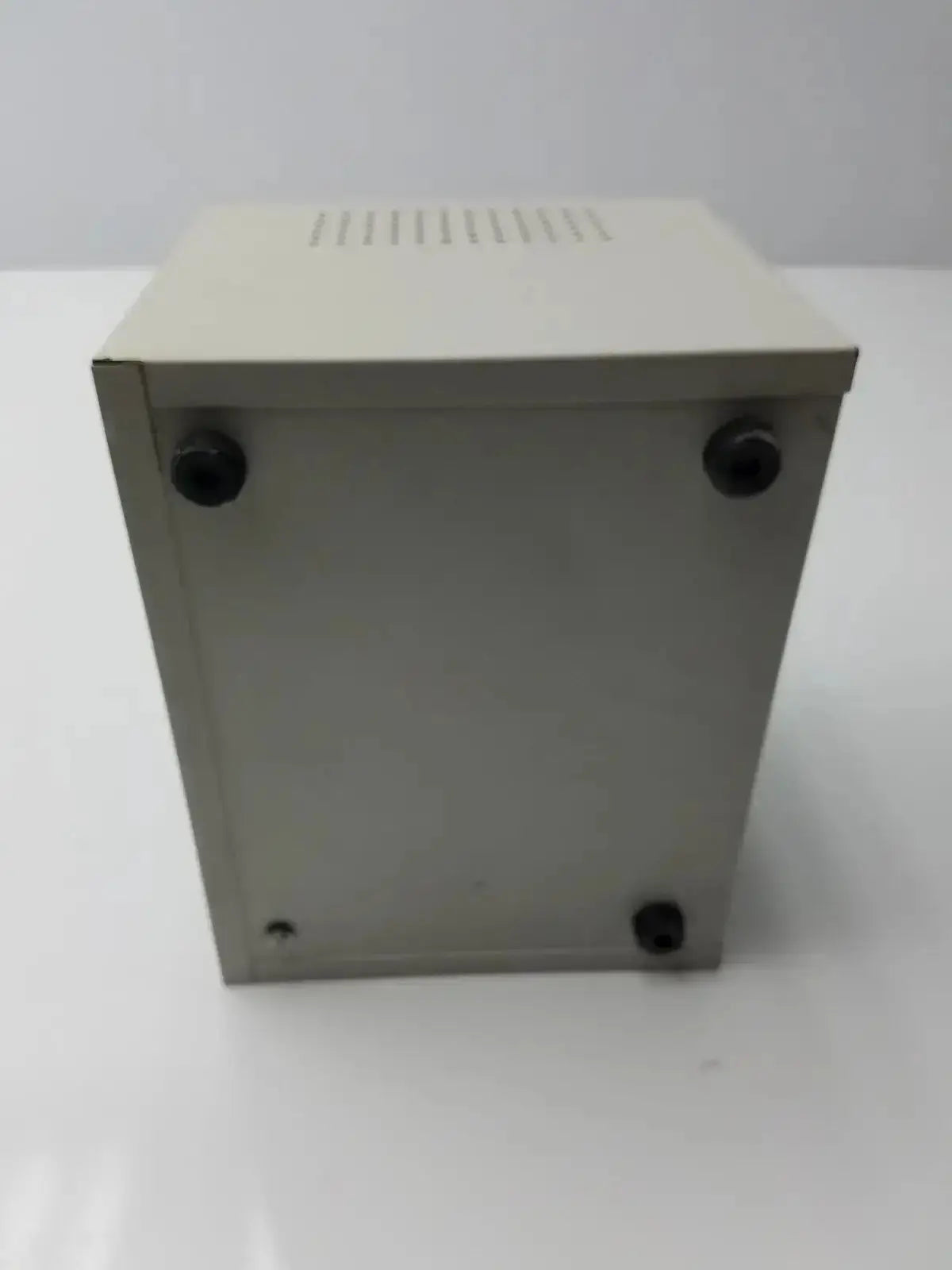 Beige metal harrick pdc-32g compact plasma cleaner sterilizer with black rubber feet and vented top table-top design