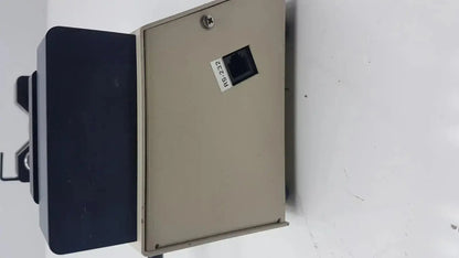 Beige metal enclosure of harvard apparatus model 11 digital single syringe pump with black rs-232 ethernet port and silver screw top