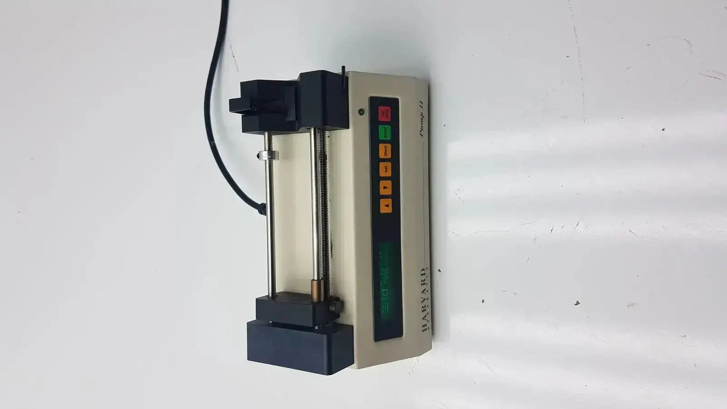 Beige and black harvard apparatus model 11 digital single syringe pump with lcd display and colored control buttons