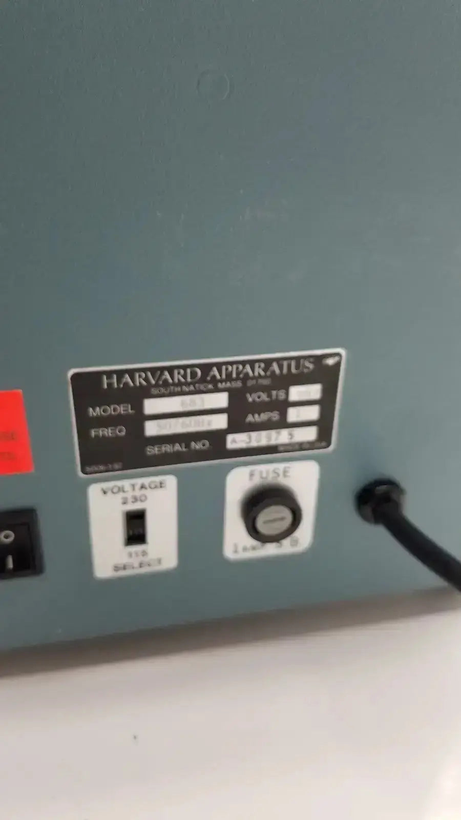 Rear view of harvard apparatus rodent ventilator model 683 with matte gray metal casing and black control panel labels