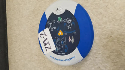 Blue and white oval-shaped automated external defibrillator heartsine samaritan pad 450p with instructional diagrams