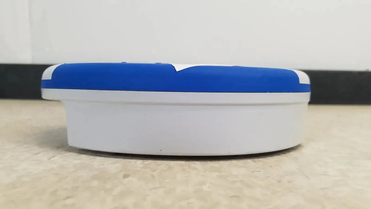 Blue and white plastic ashtray with rounded oval shape for heartsine samaritan pad 450p emergency use