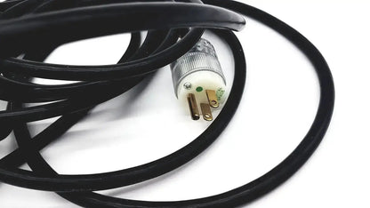 Black heavy-duty extension cord with lead single phase three-pronged plug and clear plastic housing for hospital use