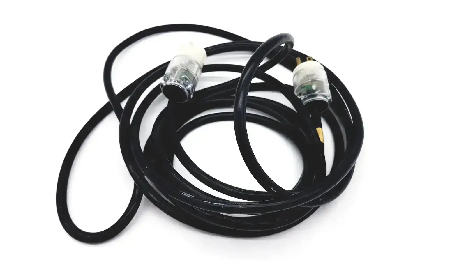 Black coiled heavy-duty extension cord with clear plastic plugs and metallic 3 pin prongs lead single phase hospital grade