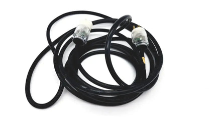 Black coiled heavy-duty extension cord with clear plastic plugs and metallic 3 pin prongs lead single phase hospital grade