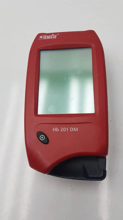 HemoCue Hb 201 DM handheld hemoglobin system analyzer with rectangular screen and black button for biomedical evaluation and reuse medical hospital surplus