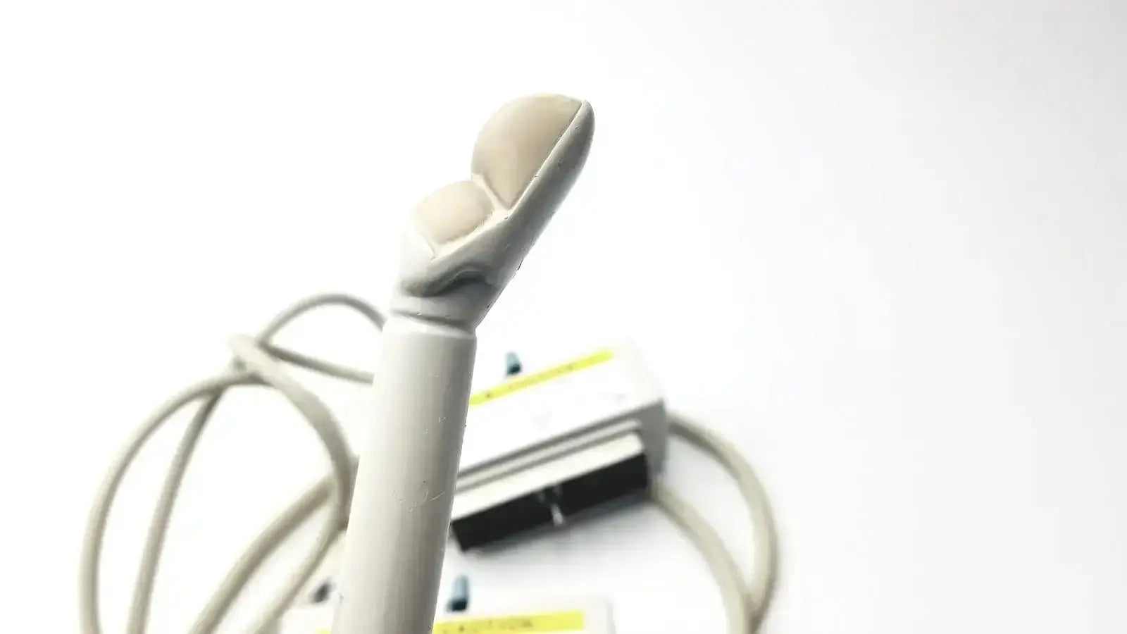 A beige ergonomic handheld ultrasound transducer with a smooth head for hitachi eup-cc331 biplane transrectal use