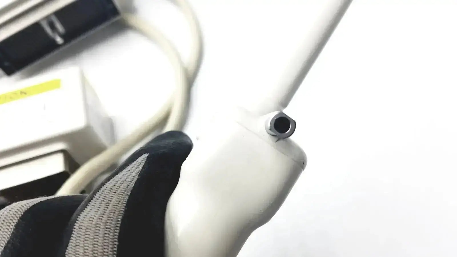 White plastic handle with metallic hexagonal socket on the hitachi eup-cc331 biplane transrectal ultrasound probe