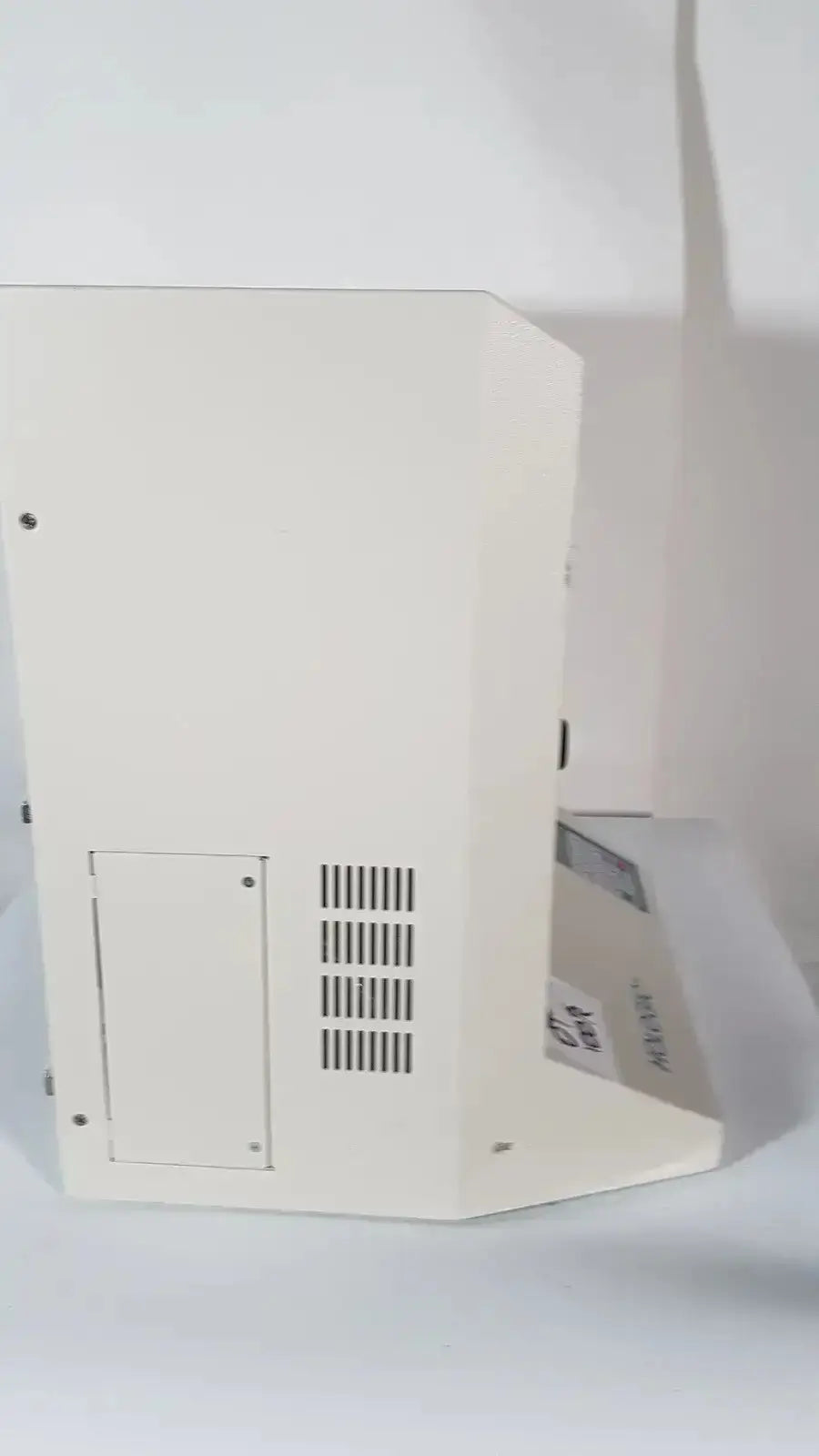 Off-white hologic thinprep 2000 processor with vented side panel and access door for biomedical evaluation and reuse medical use