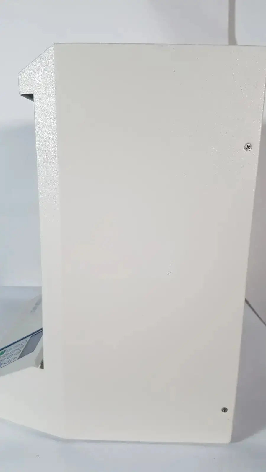 White rectangular cabinet of the hologic thinprep 2000 processor with matte finish and visible screws for biomedical evaluation reuse medical