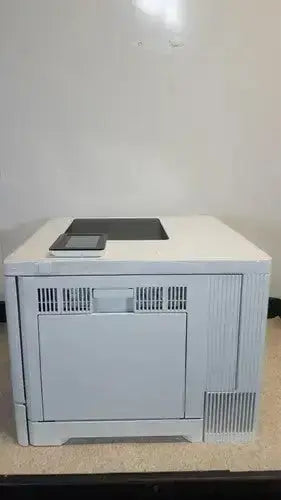 Light gray hp laser printer laserjet enterprise m555dn with touchscreen control panel and paper output tray