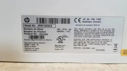 Hp pavilion 15.6-inch laptop with matte black finish and silver accents shown alongside laserjet enterprise m555dn color laser printer
